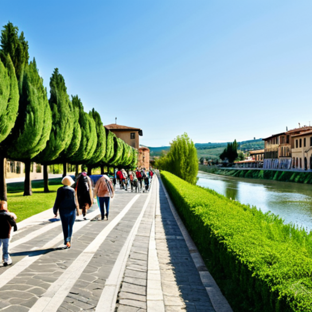 하천 생태계 복원 참여를 위한 협력 네트워크 구축 - Revitalized Riverfront Park**
"A sunny afternoon view of a restored riverfront park in Tuscany, Ita...