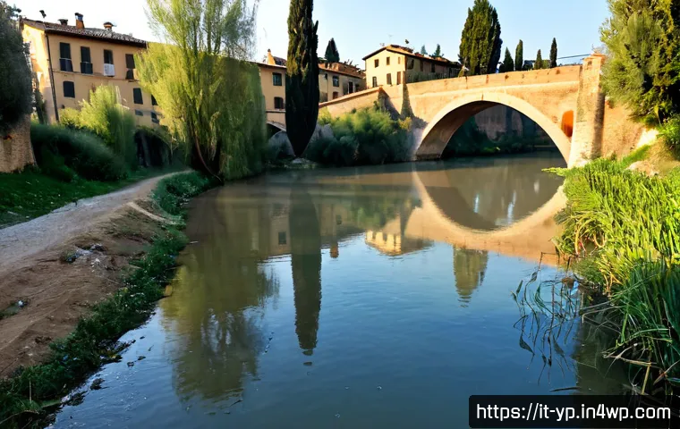 하천 생태계 복원과 지역 주민 교육의 중요성 - Photorealistic environmental restoration scene along a gentle Italian river near a small Tuscan town...